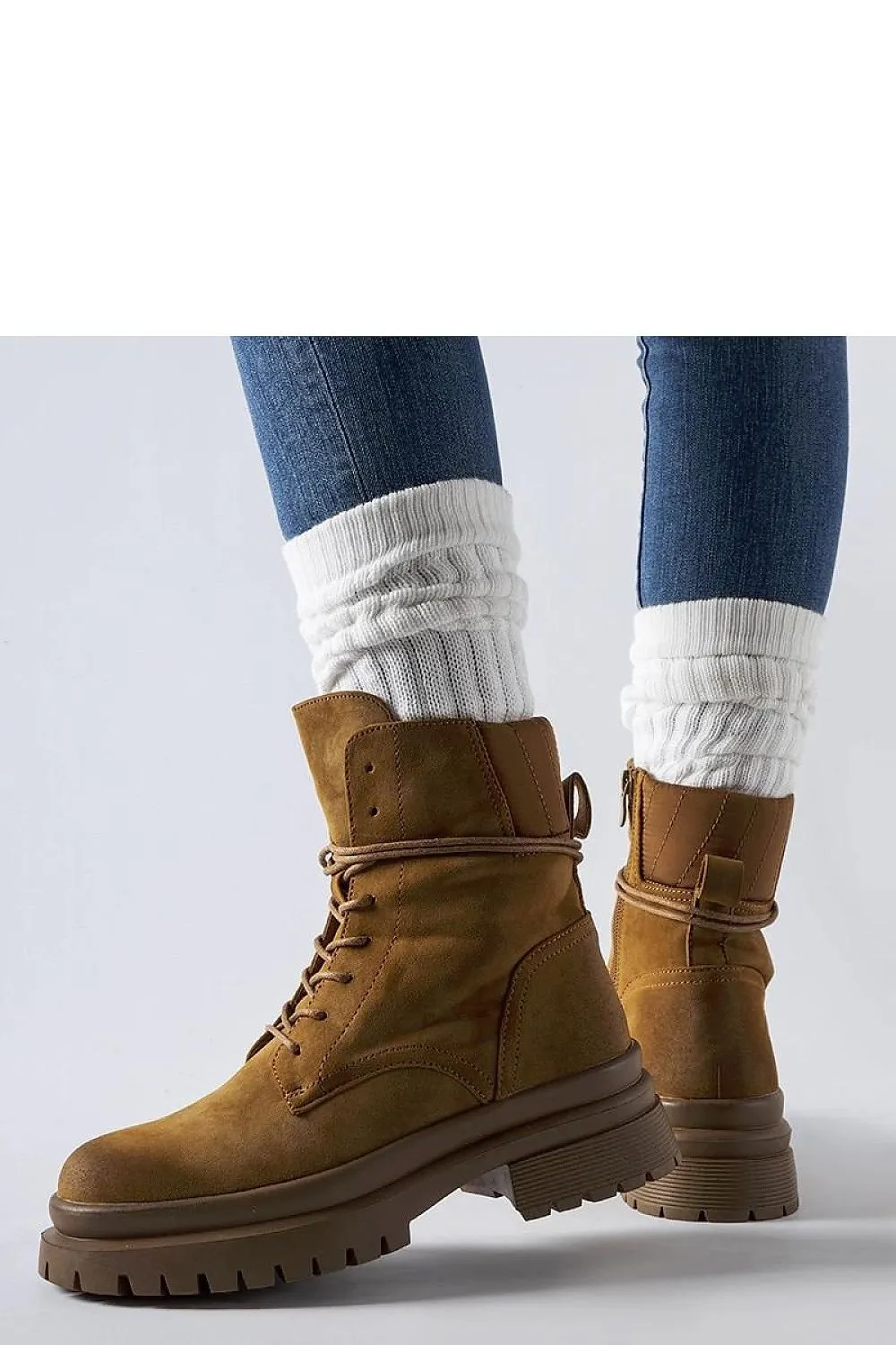 Black sneakers with a worn toe