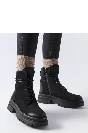 Black sneakers with a worn toe