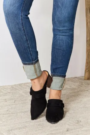 Sophisticated braided mid-heel mules