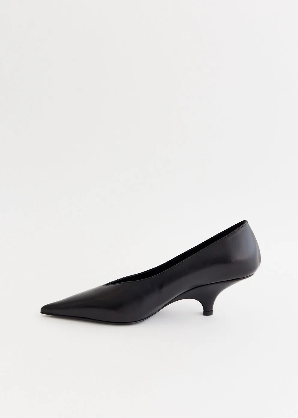The Leather Wedge Heel Pumps